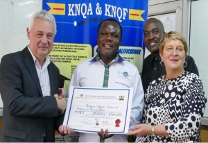 Left - Bruno Backes, Head of Vocational Training, Delegation of German Industry &amp; Commerce in Kenya (AHK). Centre - Dr Juma Mukhwana, Director General, Kenya National Qualification Authority (KNQA). Right - Maren Diale, Country Director, Delegation of German Industry &amp; Commerce in Kenya (AHK). Back right - Frank Mukuna, former Deputy Director of RAD KNQA